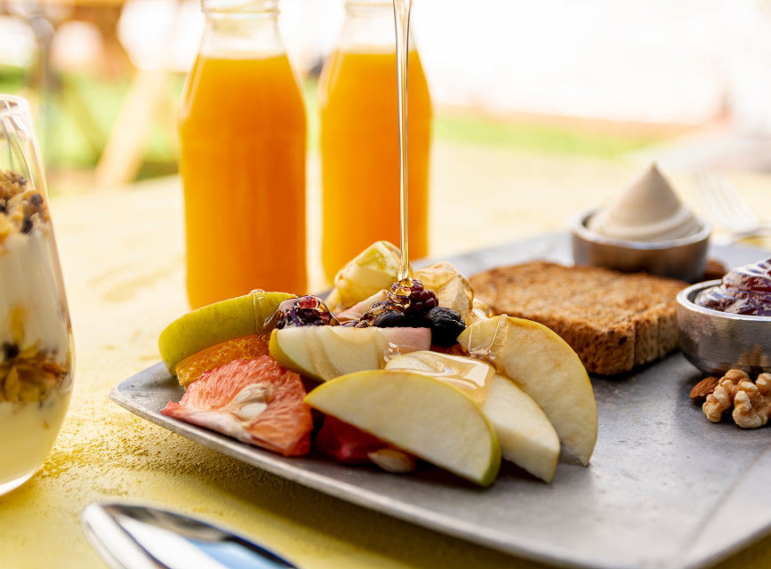 Breakfast with sea views Breakfast with fresh fruit, toast, yoghurt with granola and orange juice on the hotel terrace