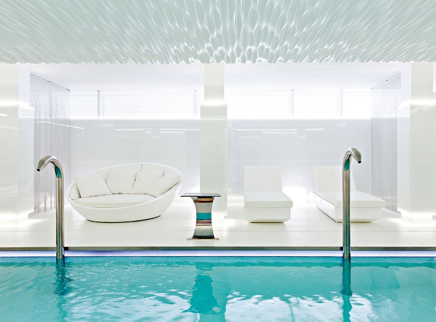 Hotel with spa in Puerto Pollensa Indoor swimming pool with designer sun loungers at our hotel in Puerto Pollensa