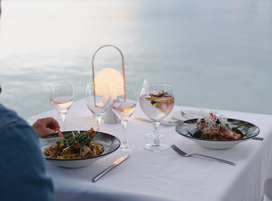 Seaside Restaurant Signature dinner at one of the tables in the hotel restaurant, just a few steps from the sea